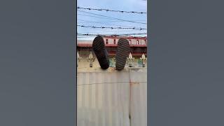 Rifkah's sandal got caught on the fence