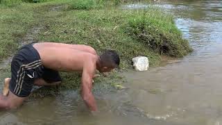 Boy struggling with big fish - Catch Fish In Hole