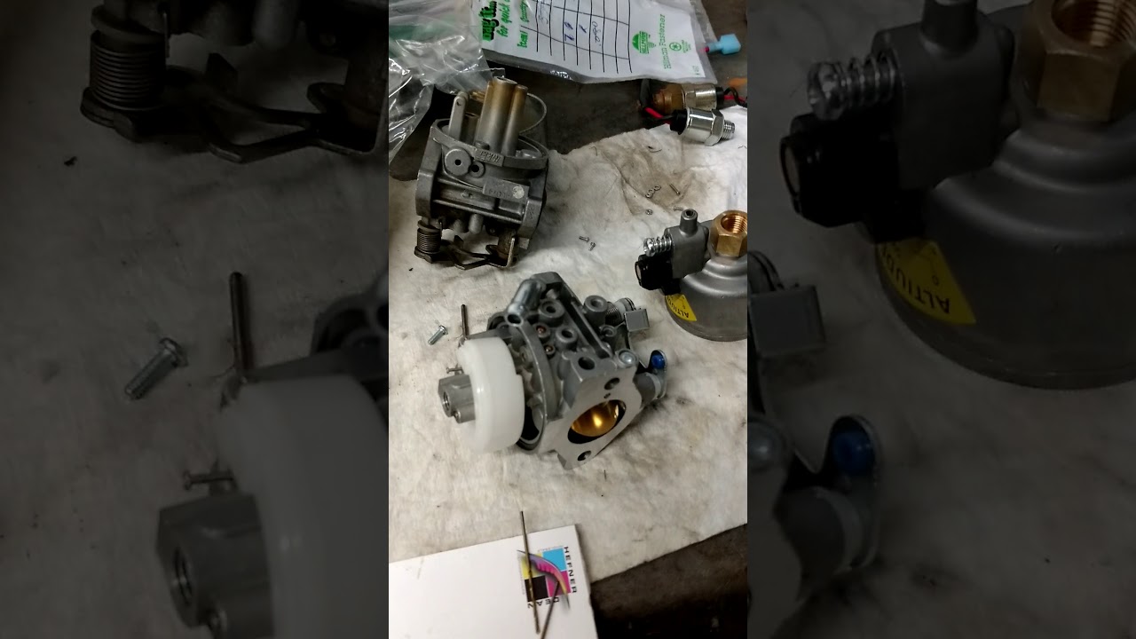 Onan generator carburetor float adjustment. - YouTube