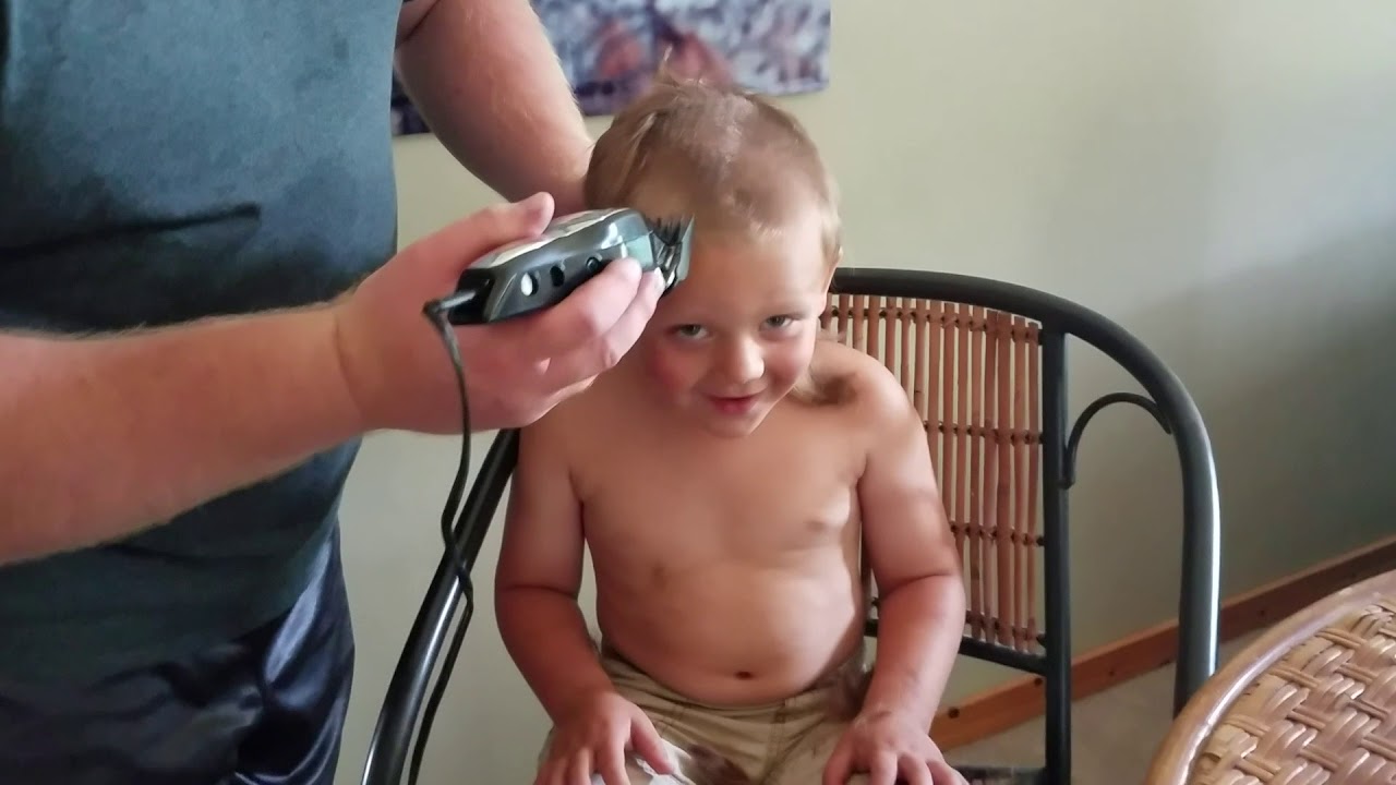 Daddy gives Ethan a buzz haircut