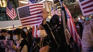 Hong Kong protesters praise U.S. legislation amid violent clashes with riot police