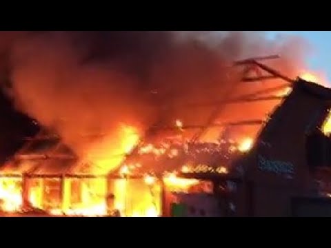 Fire engulfs Budgens of Holt building owned by family of local MP