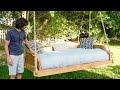 Porch bed swing from a chainsaw milled ash log