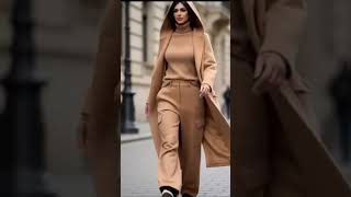 Camel color total look with hooded long overcoat and bulky cargo cashmere pants.