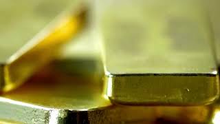 VideoVault Stock Video: Freshly made 24 carat gold bars