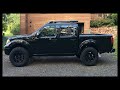 AllDogs Offroad RCKilla lift kit post installation on my Nissan Frontier