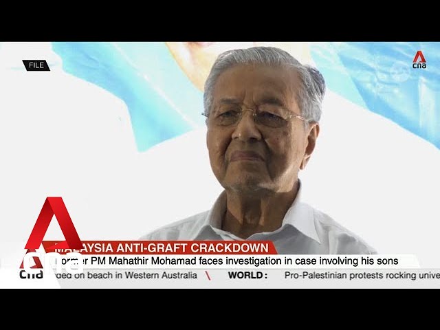 Former Malaysia PM Mahathir being investigated in anti-graft probe involving his sons class=