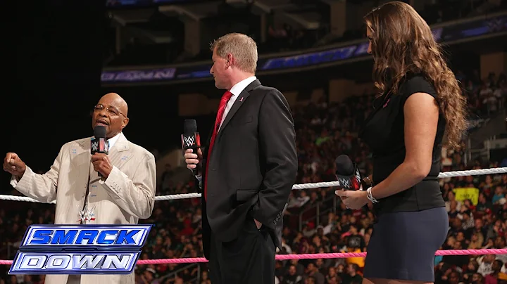 Theodore Long, Stephanie McMahon and John Laurinai...