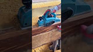 Download Lagu Smoothing the rough wooden beam carefully using an electric planer MP3