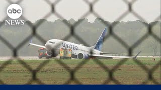 United flight rolls off runway