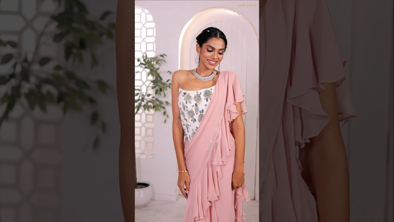 Mauve ruffle saree with hand painted corset #saree #rufflesaree #corset #blousedesign
