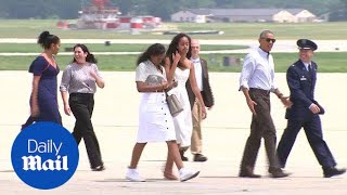 Obamas depart for final summer vacation as first family - Daily Mail
