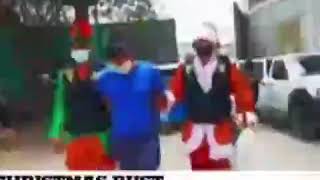 Moment two undercover police officers dressed as Santa Claus and Elf make drug bust to arrest