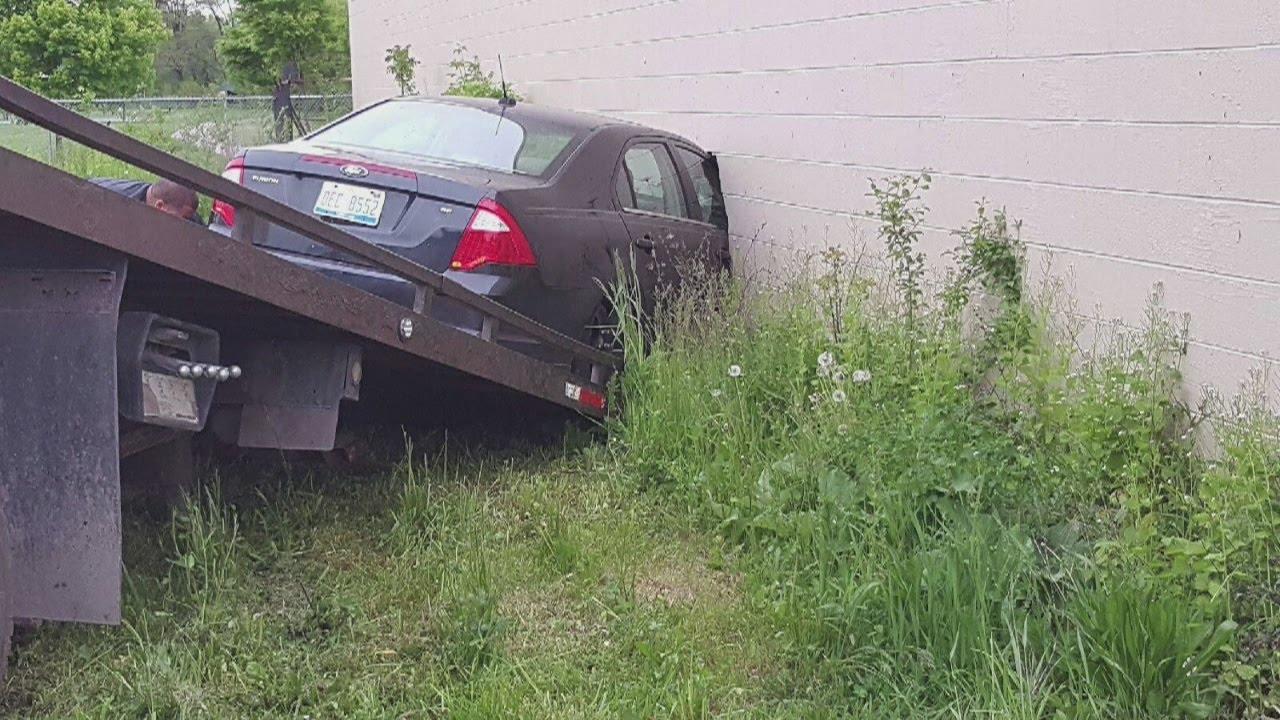 Wild police chase ends with car in building