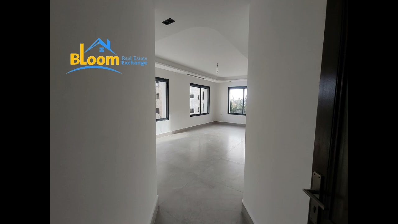 شقة طابق أرضي للبيع في الدوار الرابع قرب جسر عبدون.