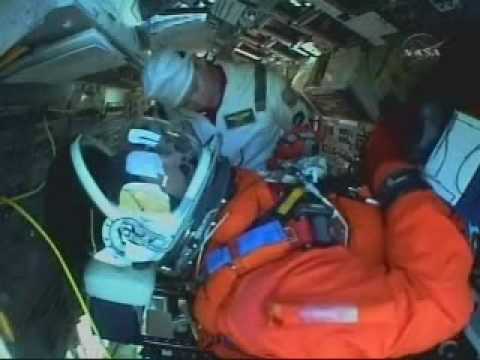 STS-119 Discovery Crew Strap In the Orbiter