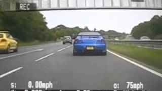 Unmarked Police Motorbike follows Two Racing Cars at 145 MPH