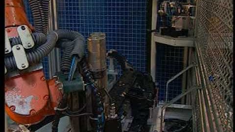 Automatic insertion of screws in plastic vehicle members with a KUKA robot