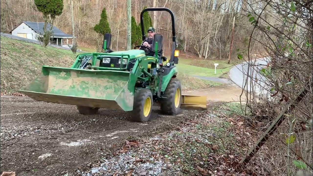 John Deere 2025r Grading steep hill YouTube