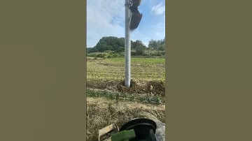 The process of burying power poles with excavators