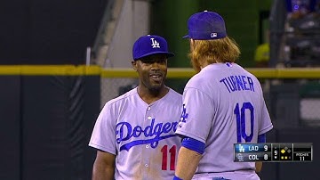 LAD@COL: Rollins makes the tough stop, gets Arenado