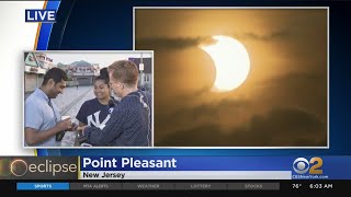 Early Risers Enjoy Rare Sunrise Eclipse On Jersey Shore