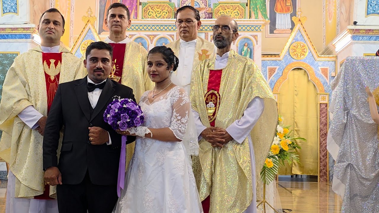Wedding Nuptials of loving Ivan Dsouza Agrar with Lolita Dsouza Farla at Agrar church Bantwal