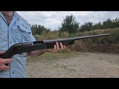 Check out this funky vintage shotgun! A very cool but odd design