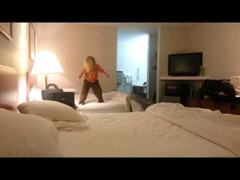 Toren jumping between hotel beds - 03