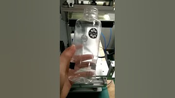 Machine testing video of using new mould to label square bottle, transparent labels,full wrap label