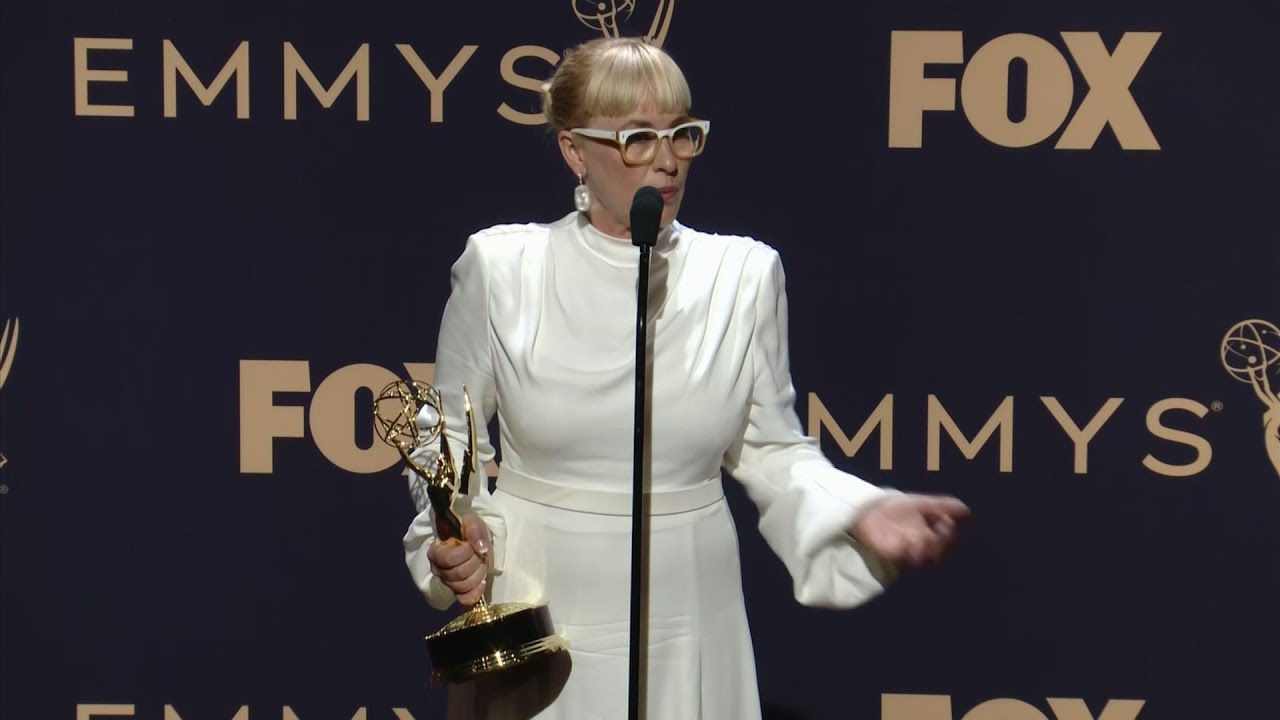 pressed cafe Arquette and Oliver celebrate Emmy wins backstage