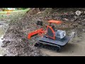 Máy xới bánh xích chạy lầy,(video củ )