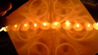 6 ring magnets row  of candles ferrocell ish  ferrophoto