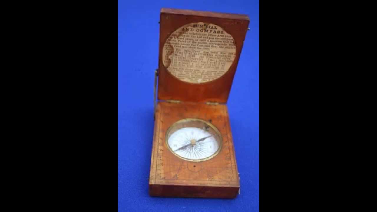 Diptych portable sundial compass