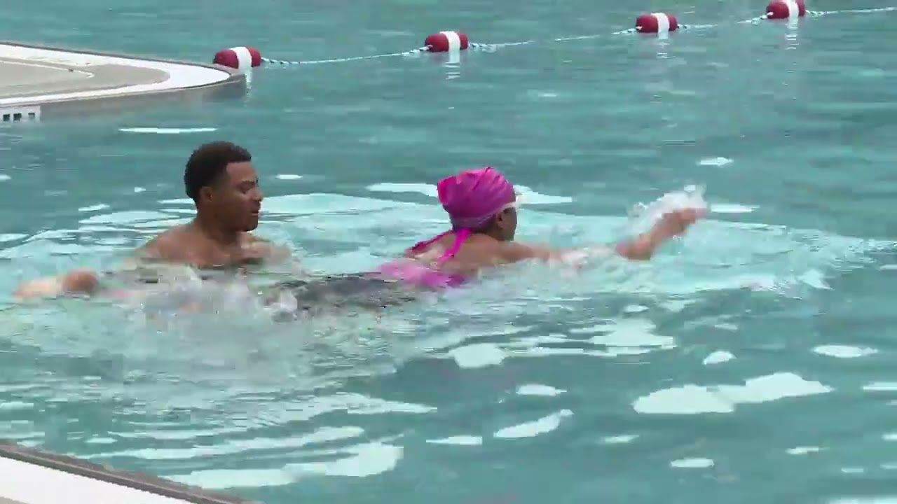 Facing the fear: News anchor learns to swim, challenging global statistics