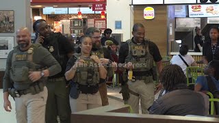 ICE is seen at Atlanta airport amid partial shutdown causing long TSA lines