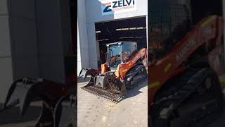 Kubota SVL75 fitted with a grapple rake bucket Kubota SVL75 fitted with a grapple rake bucket