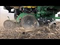 Planting Corn Between Storm Clouds