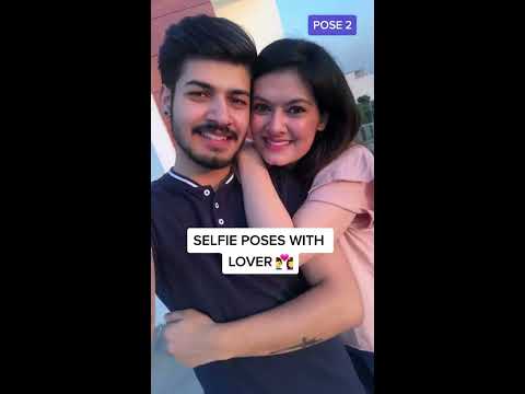 Premium Photo | Portrait of young happy couple in love smiling and  embracing in garden sweet lovers wearing in stylish dark sunglasses and  casual clothes posing and looking at camera at daytime