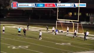Immokalee's Kesly Benoit puts the moves on the defender then crosses it for the assist