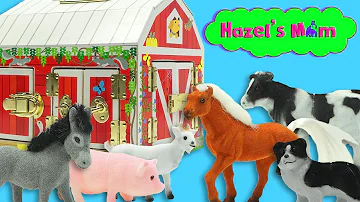 What farm animals are hiding behind the barn doors?