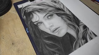 Beautiful girl Drawing using charcoal powder and graphite pencil