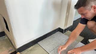 Cutting in a carpet tile complicated corner without a tape measure. Just flipping tiles.