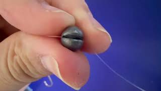 How to add a split shot weight to a fishing line.