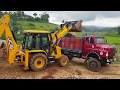 Jcb loading  stone in a truck - jcb loading video