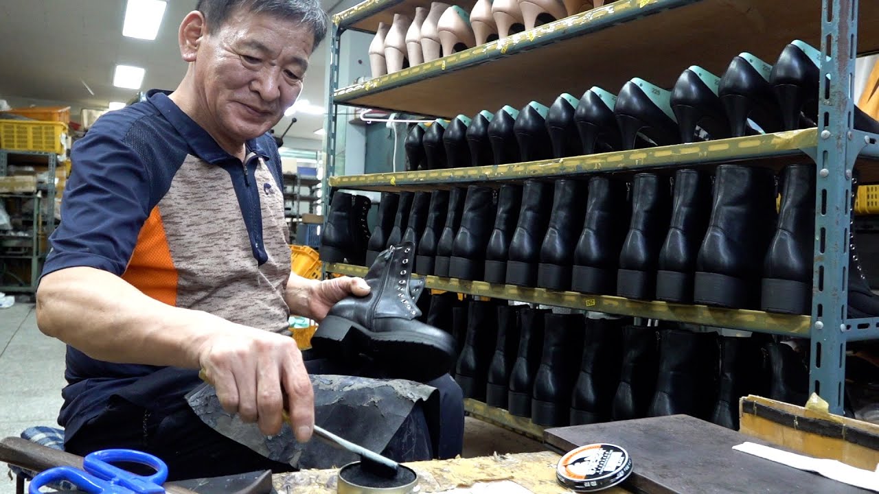 Process of Making Leather Boots by Old Artisans in a Korean Factory. Old Shoe Factory in Korea.