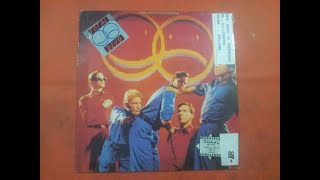 DEVO.''TOTAL DEVO.''.(THE SHADOW.)(12'' LP.)(1988.)