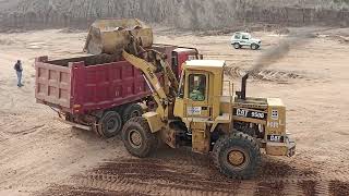 caterpillar 950B wheel Loader loading soil on dupmtruck. operator Smart skill and smart work