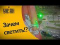 В Беларуси ОМОНовец "просвечивал" окно лазером, потому что на балконе висел бело-красный флаг