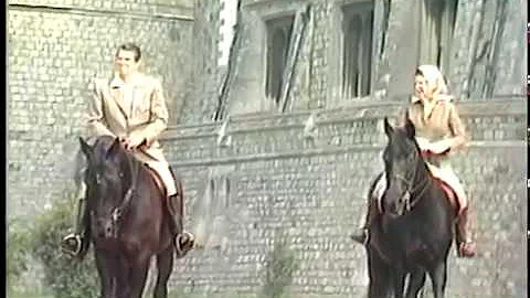 President Reagan horseback riding with Queen Eliza...